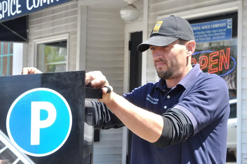 TPS technician servicing a parking terminal
